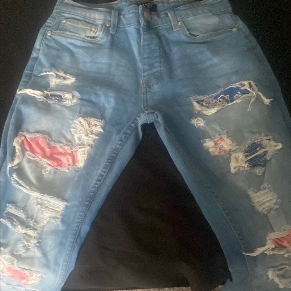 Blue Skinny Jeans with Distressed Design
